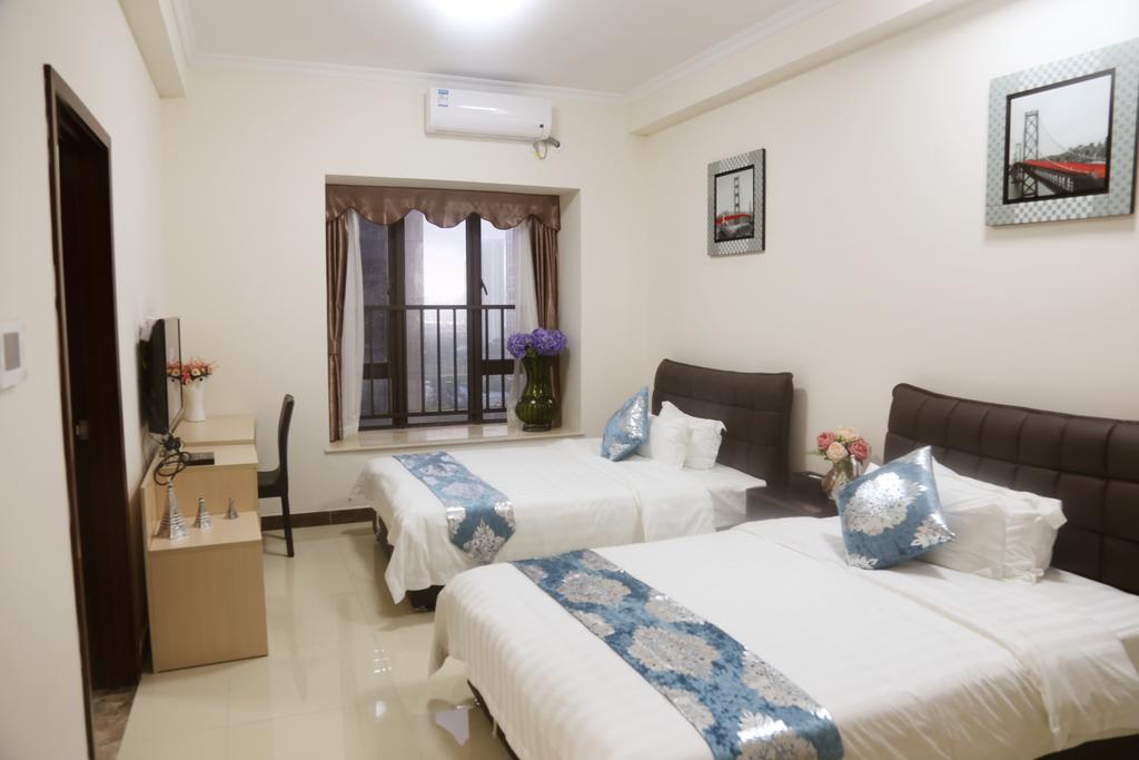 Guangzhou Yi Long International Apartment Zimmer foto